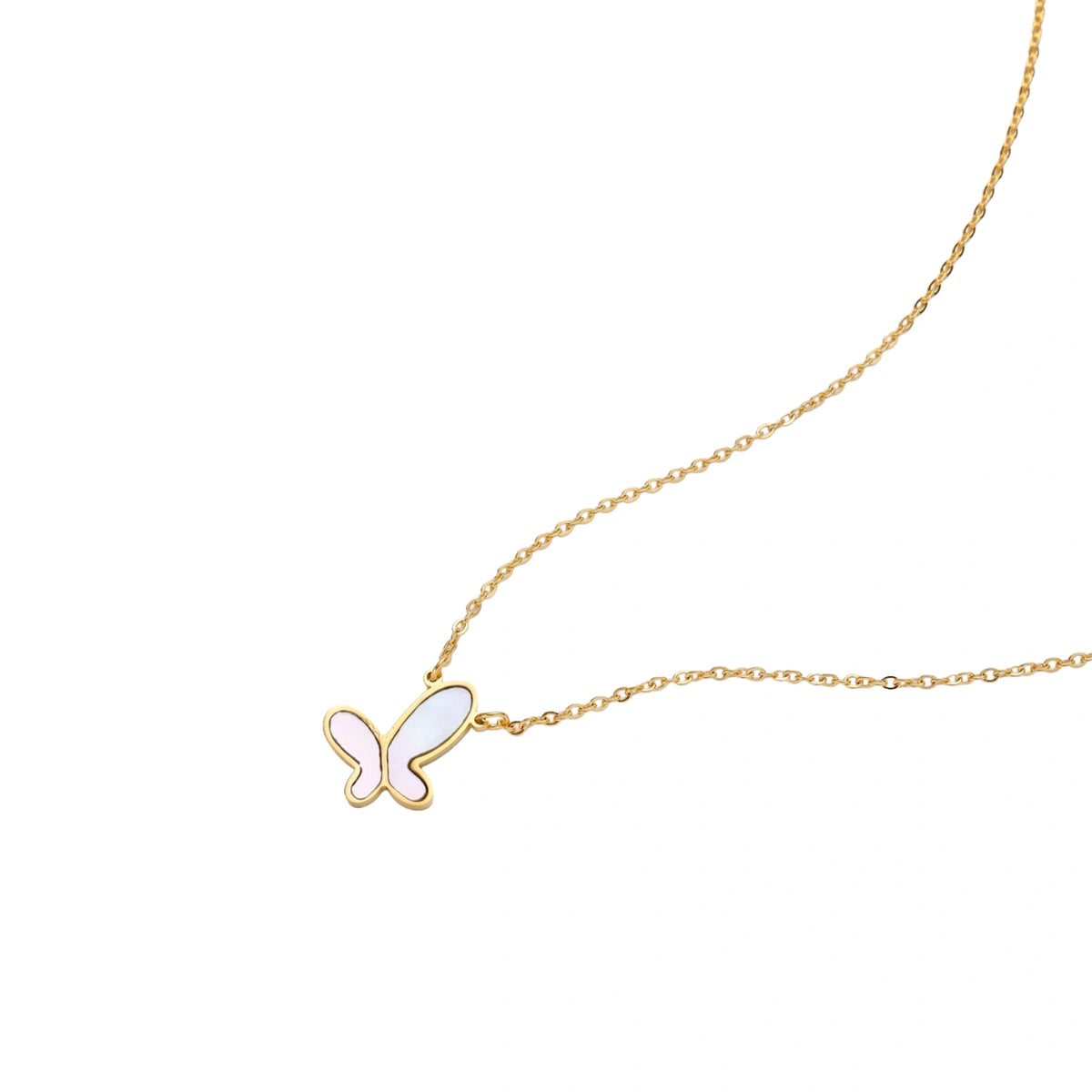 Gold-plated butterfly pendant with iridescent mother of pearl inlay on delicate chain against cream background.