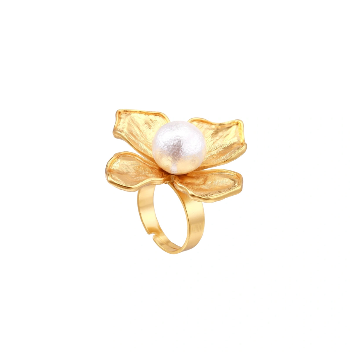 Gold-plated flower ring with textured petals and white cotton pearl center on cream background