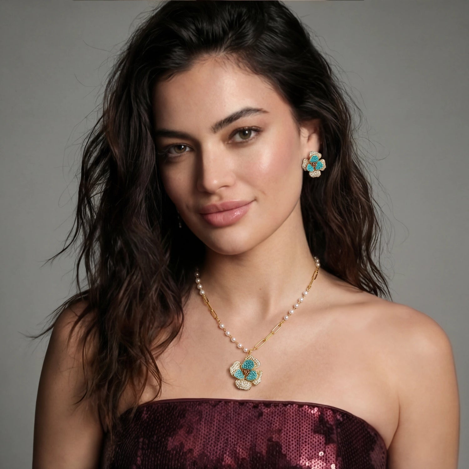 14K gold-plated jewelry set with turquoise Zirconia and Pearls by flyliving, featuring flower-shaped earrings and pendant.