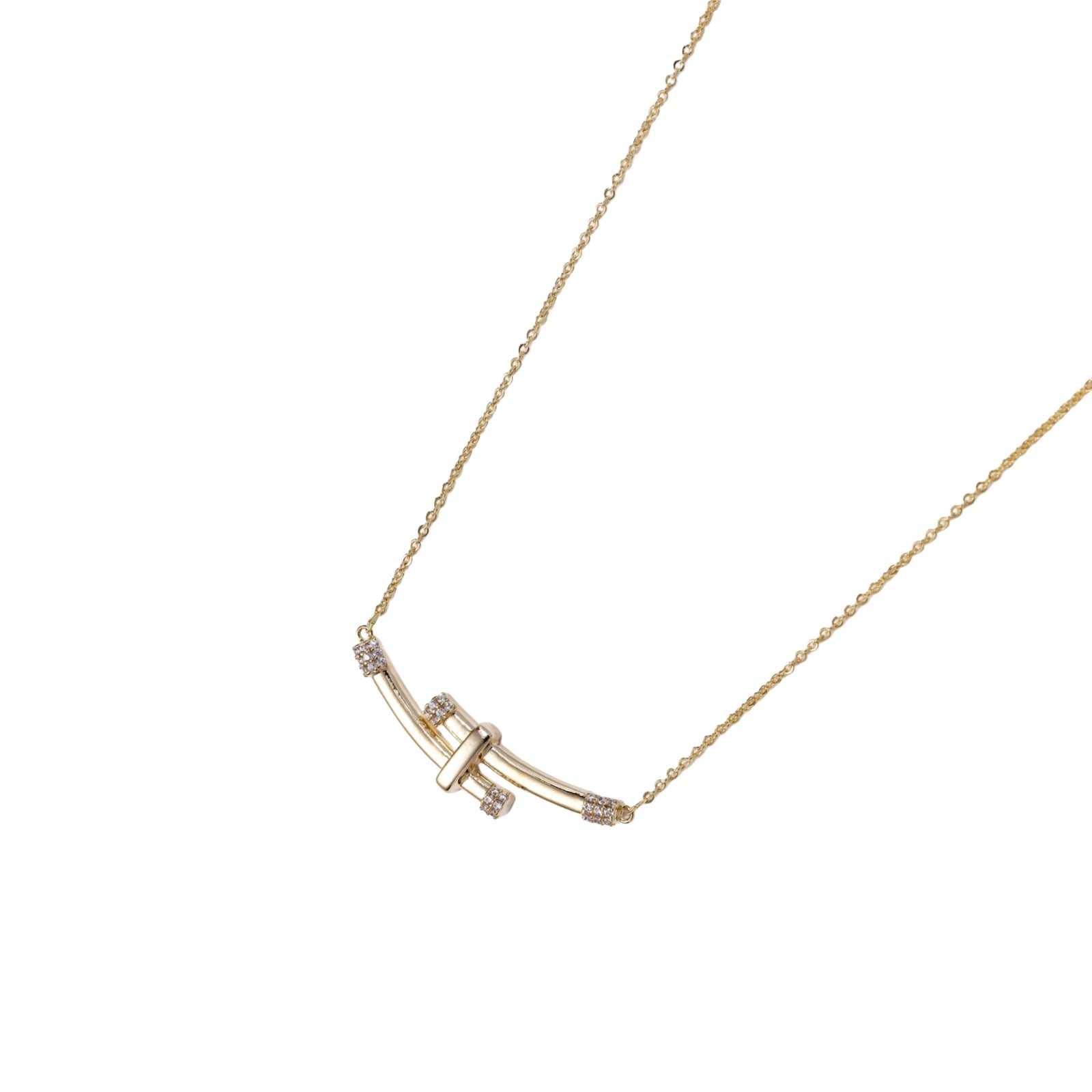 Gold-plated curved bar necklace with diamond accents on delicate chain against cream background