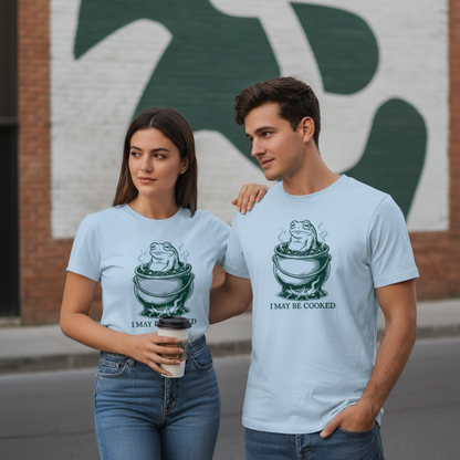 Leichtblaues Baumwoll-T-Shirt mit grünem Frosch im Topf und Spruch i may be cooked Sarkastisches Frosch T-Shirt