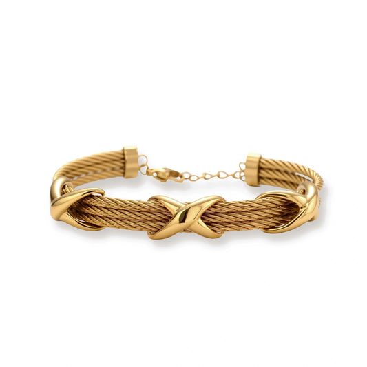 Gold-tone multi-strand twisted cable bracelet with polished X-cross knot accents and adjustable lobster clasp chain.