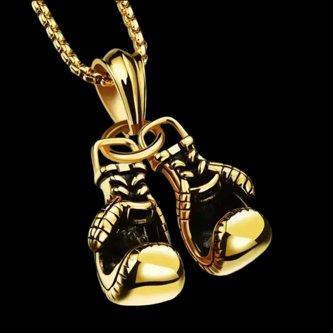 "Die Halskette „Angela“ von flyliving ist eine Unisex-Edelstahlkette mit Boxhandschuh-Anhänger, verziert mit schwarzen Akzenten und feinen Details – ein stilvolles Highlight für jede Schmuck-Kollektion."