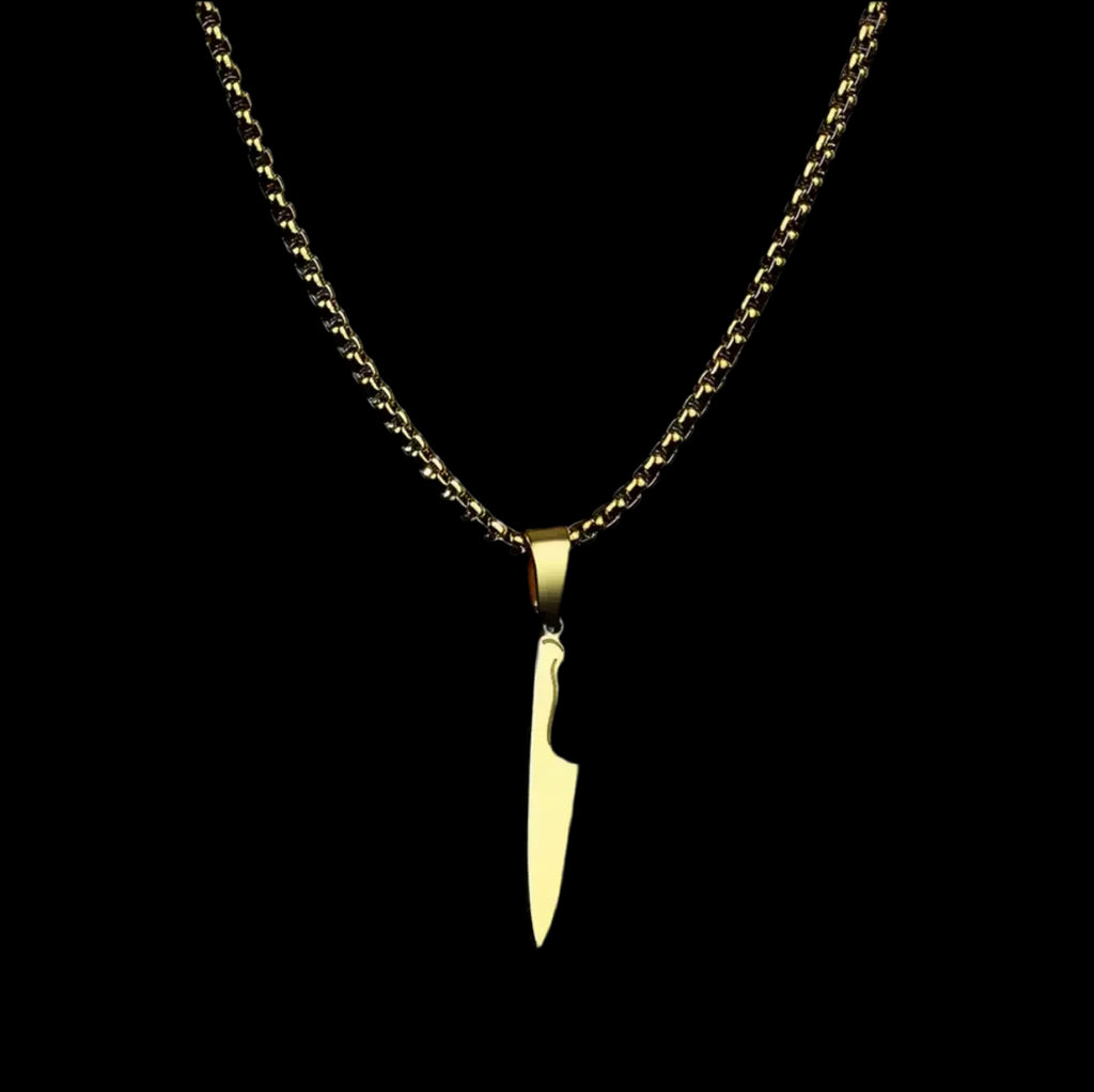 "Goldene Halskette mit einem Anhänger in Form eines Messers."