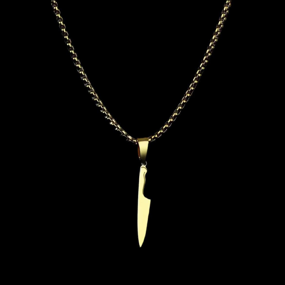 "Goldene Halskette mit einem Anhänger in Form eines Messers."