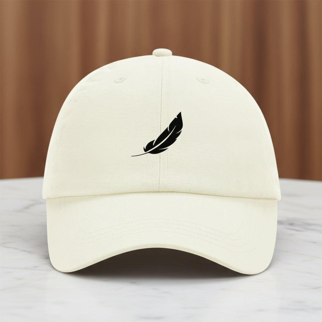 Beige baseball cap by flyliving with a black feather logo on the front, front view.