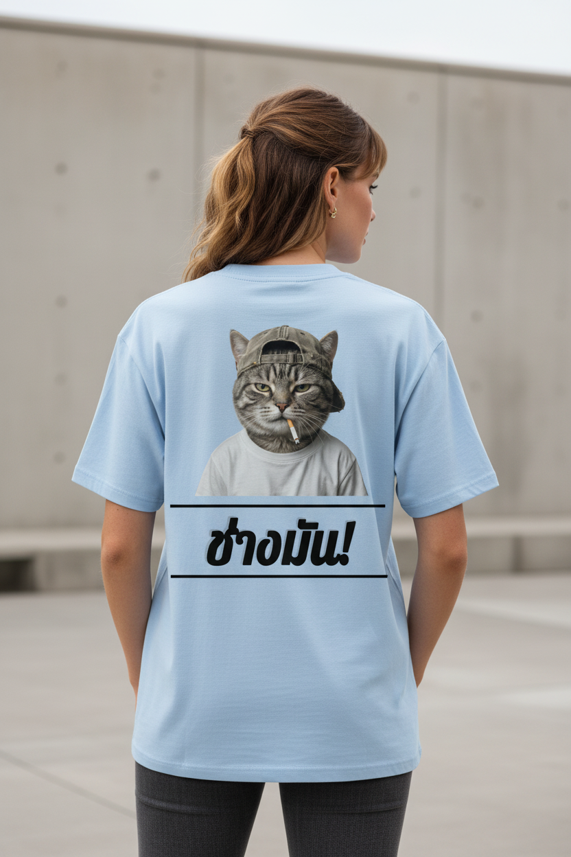 Light blue oversized T-shirt by flyliving, featuring a cool cat smoking and Thai 'F*ck it!' text graphic on the back.