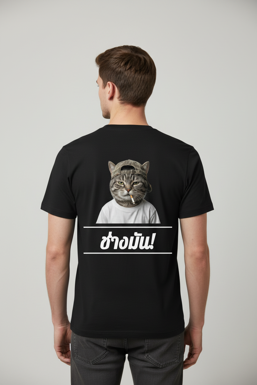 Black organic cotton t-shirt by flyliving, featuring a smoking cat in a cap graphic and white Thai text on the back, worn by a man.