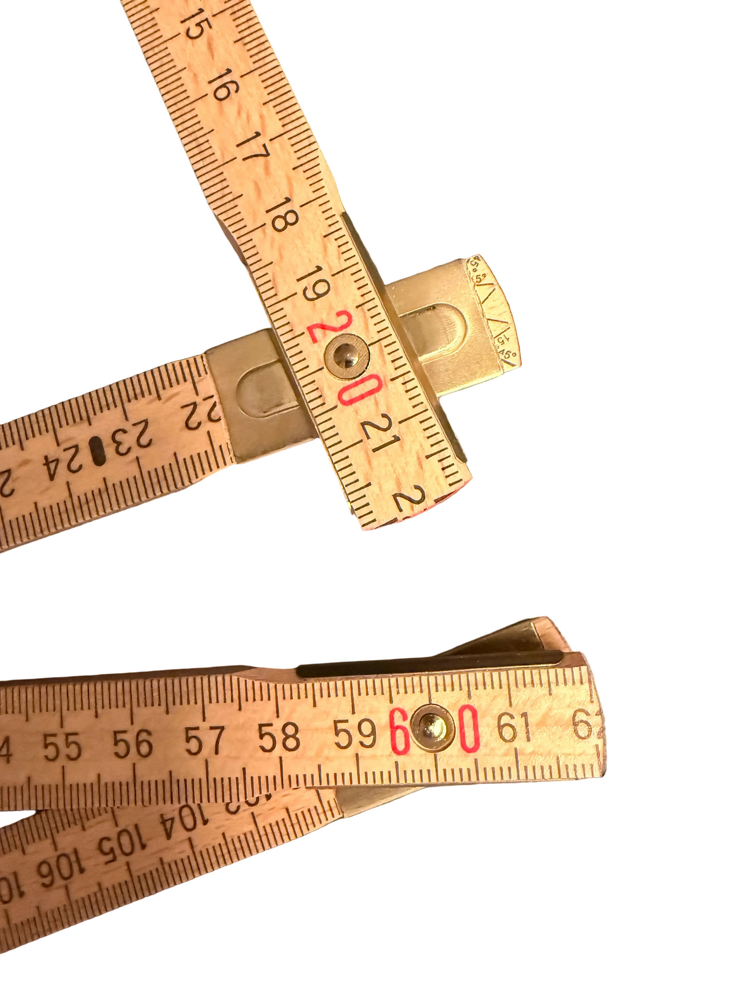Wooden folding rule by flyliving, partially folded showing segments with black numbers and prominent red numbers 20 and 60.