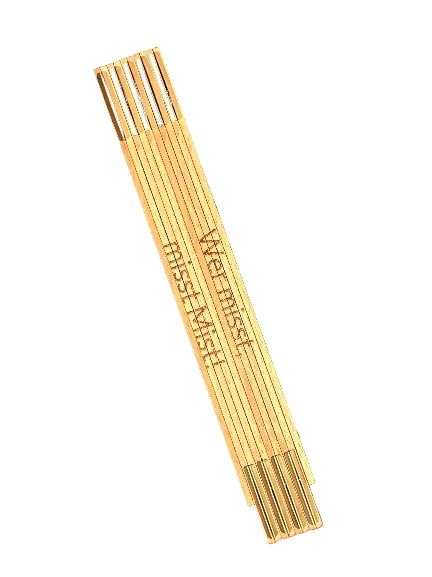 Personalized wooden folding rule by flyliving, engraved with German text "Wer misst miss Mist!" and "miss! Misch!", angled view.