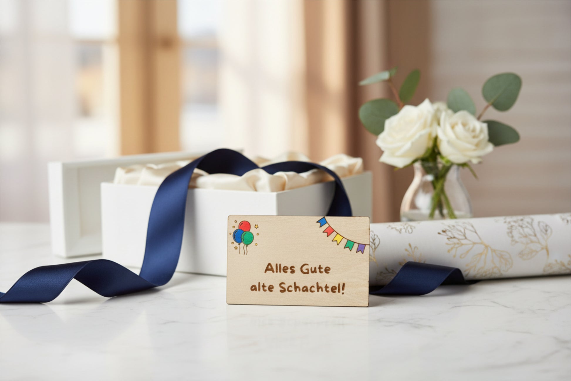 Wooden gift card by flyliving inscribed with 'Alles Gute alte Schachtel!' and decorated with balloons and colorful bunting.