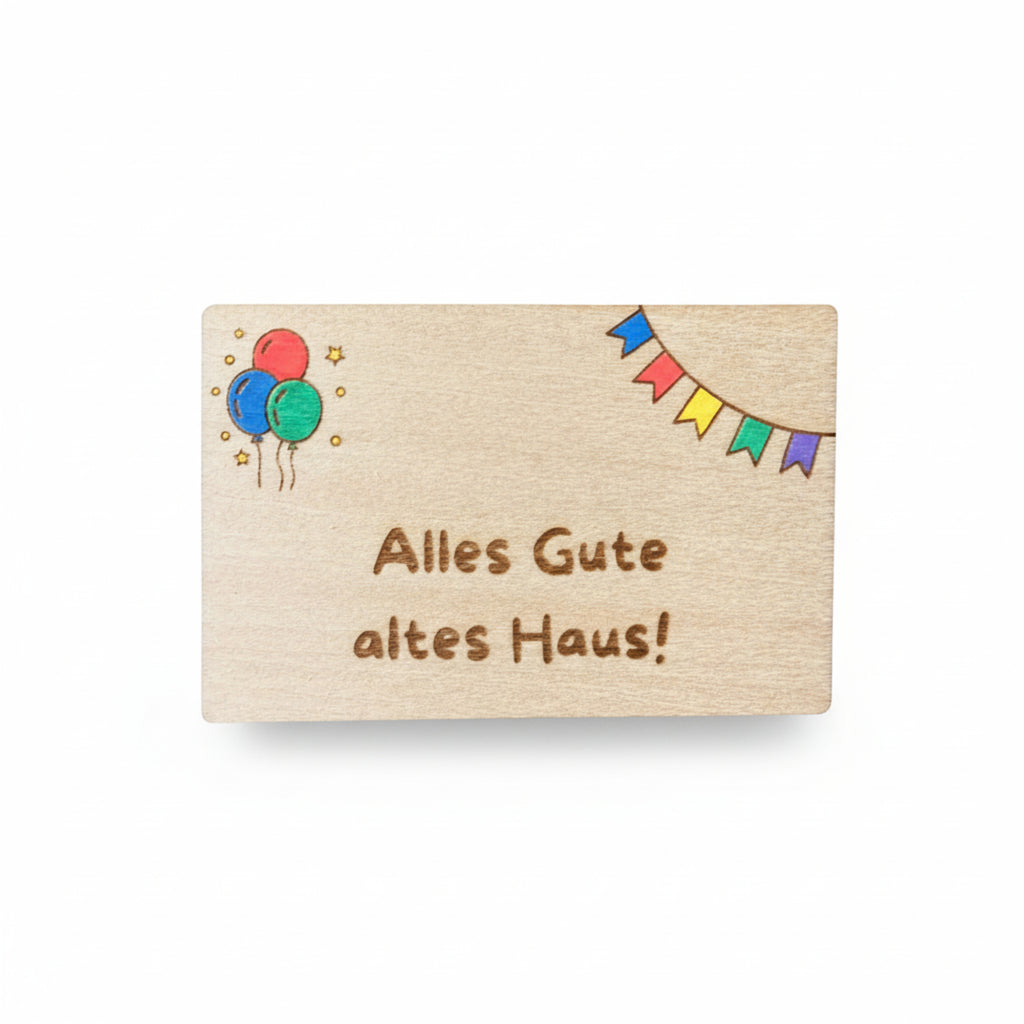 Wooden gift card by flyliving with engraved German text, colorful balloons, stars, and pennant flags.