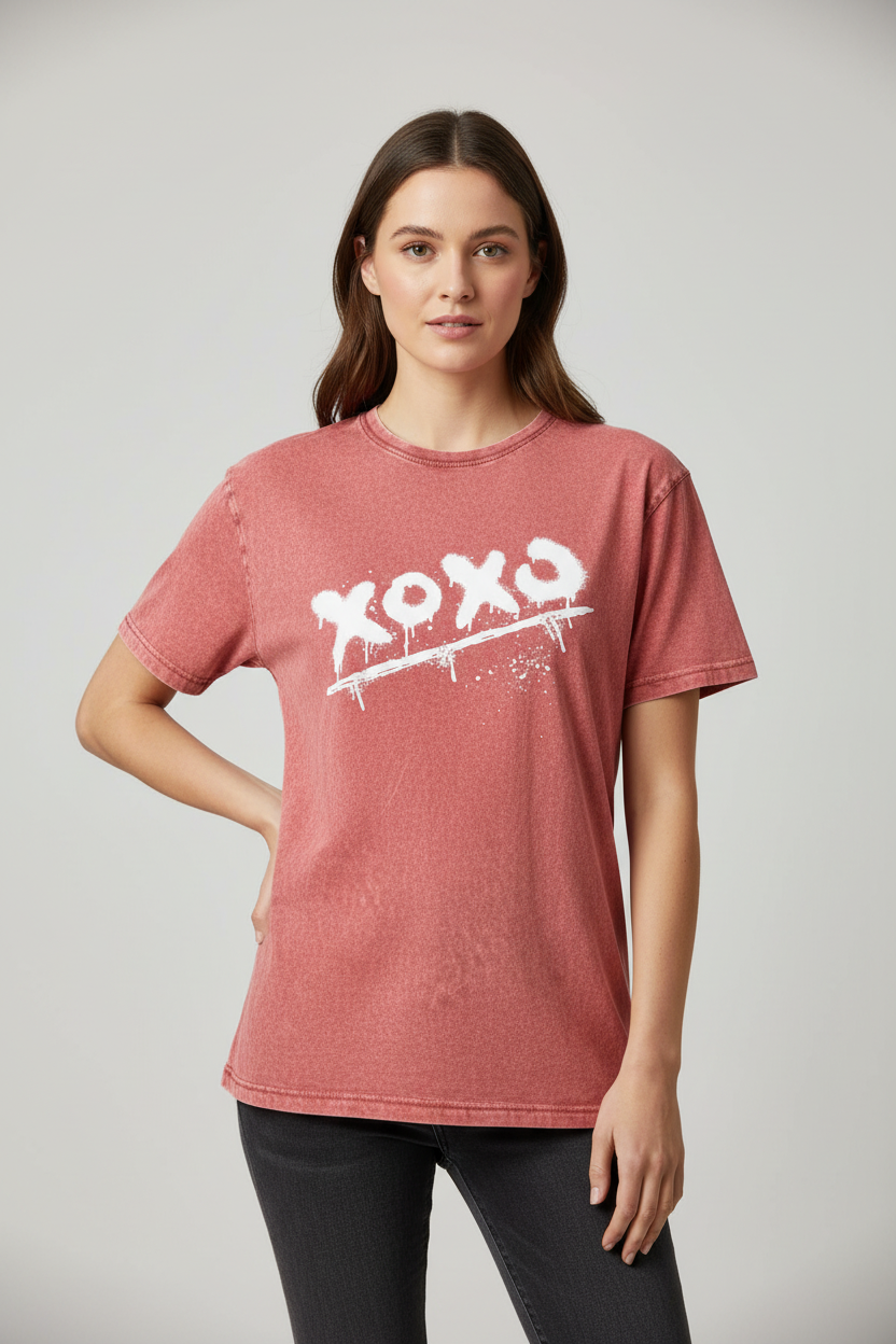 Faded red cotton T-shirt by flyliving, with a crewneck and white XOXO graphic in spray paint style.
