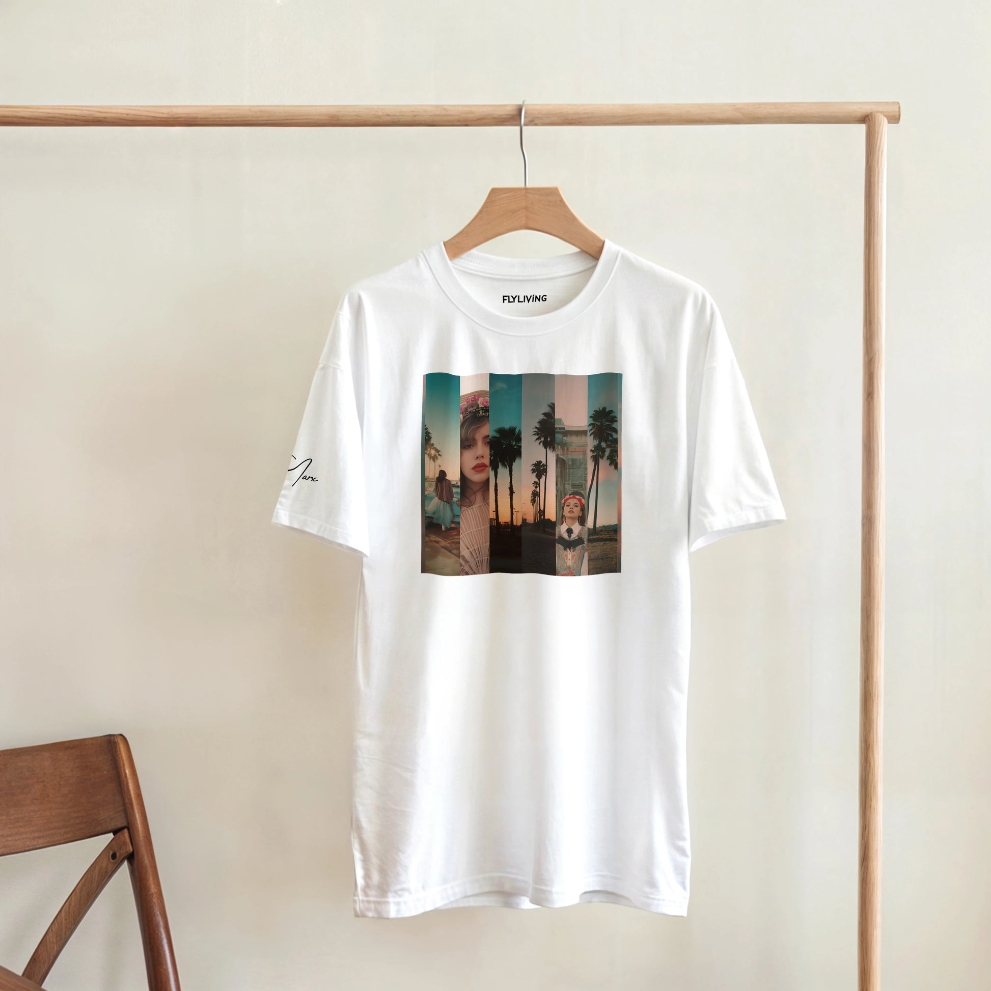 Weißer baumwoll-heavyweight-t-shirt mit rechteckigem tropischem grafikdruck auf hölzernem kleiderbügel