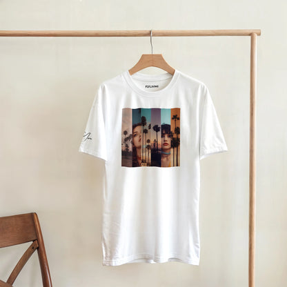 Weißes cotton t-shirt la sentimental heavyweight mit farbigem print zweier frauen und palmen vor verlaufshimmel
