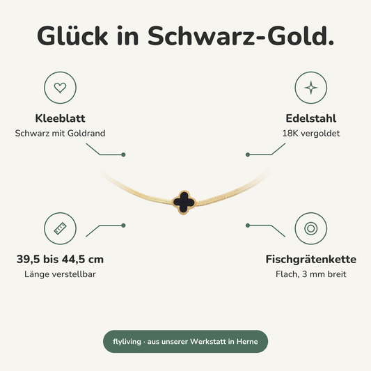 Erklärbild Glück in Schwarz-Gold. Kleeblatt: Schwarz mit Goldrand, Edelstahl: 18K vergoldet, 39,5 bis 44,5 cm: Länge verstellbar, Fischgrätenkette: Flach, 3 mm breit