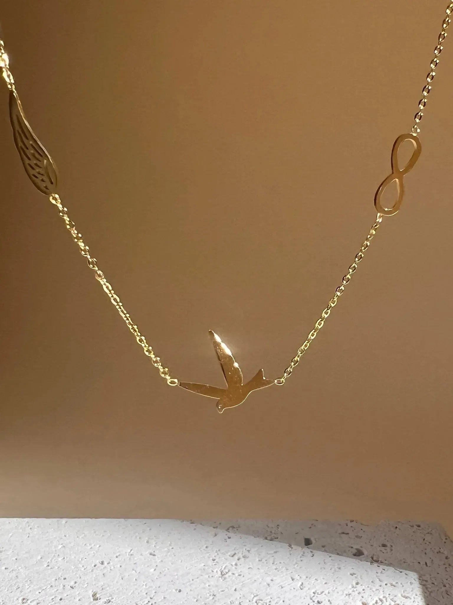 Edelstahlkette mit Engelsflügel-Vogel-Unendlichkeit-Motiv