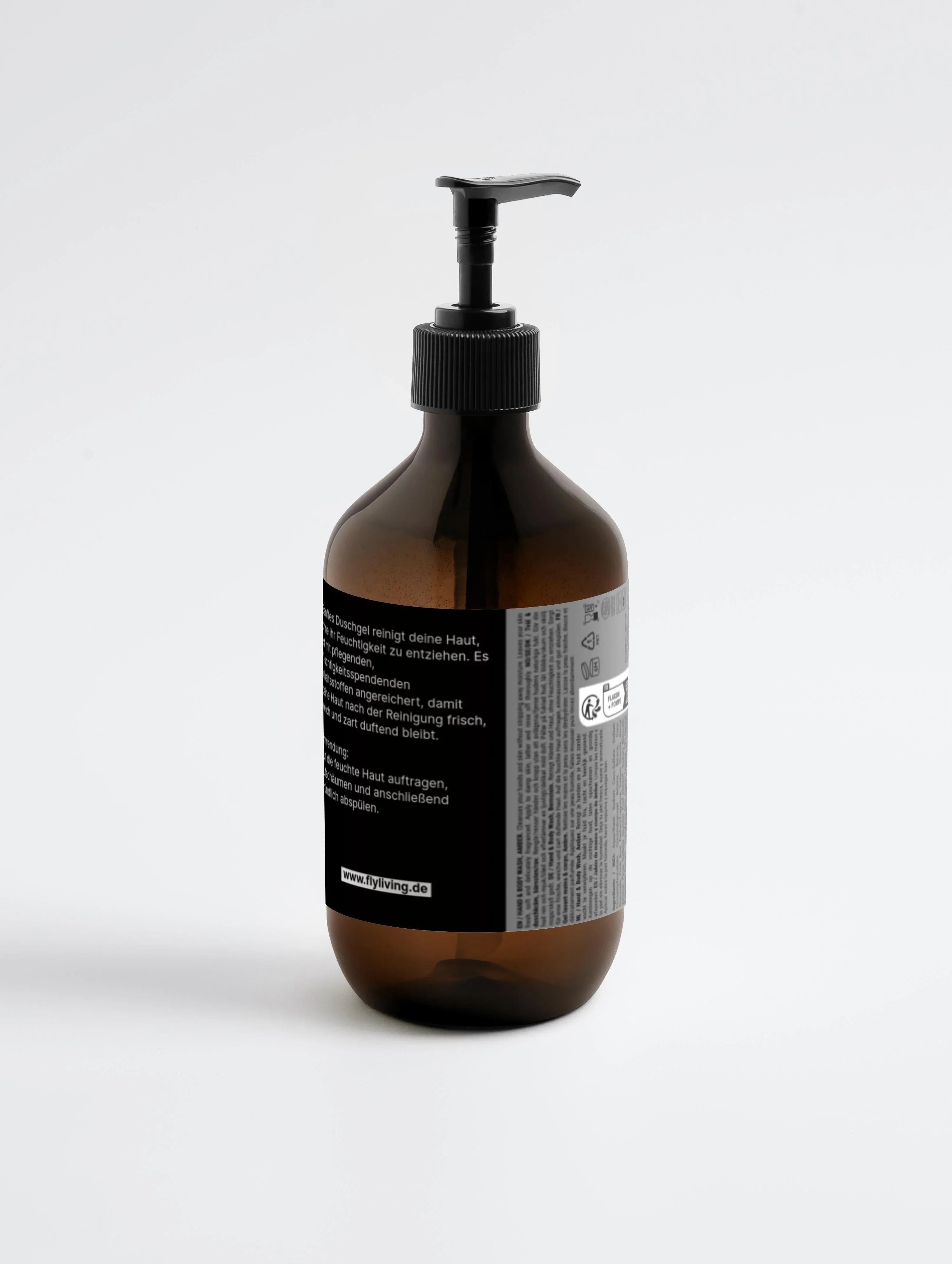 Braunes Duschgel mit Patchouli- & Amber-Vanille-Duft von flyliving, in einer wiederverwendbaren Spenderflasche.