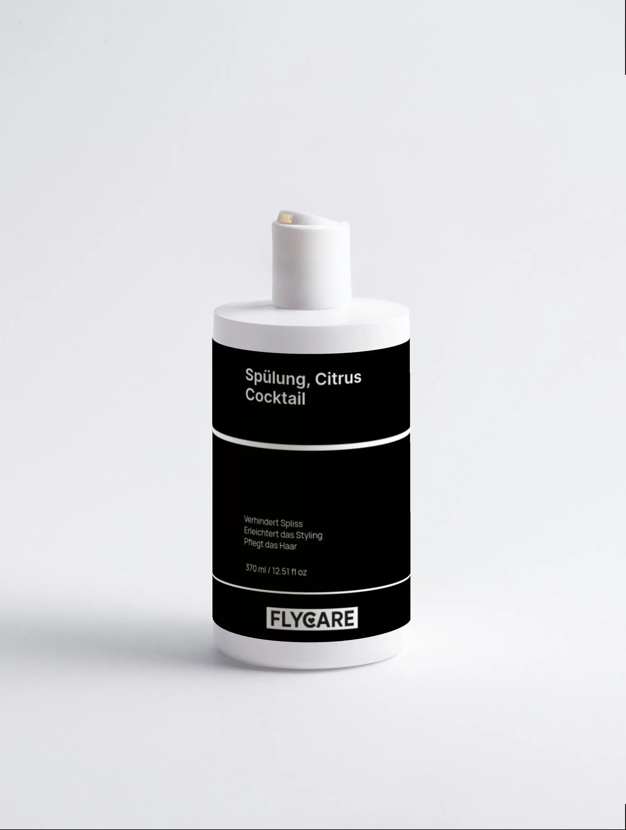 Weiße Spülung, Citrus Cocktail von Flycare, mit schwarzem Etikett auf weißem Hintergrund.
