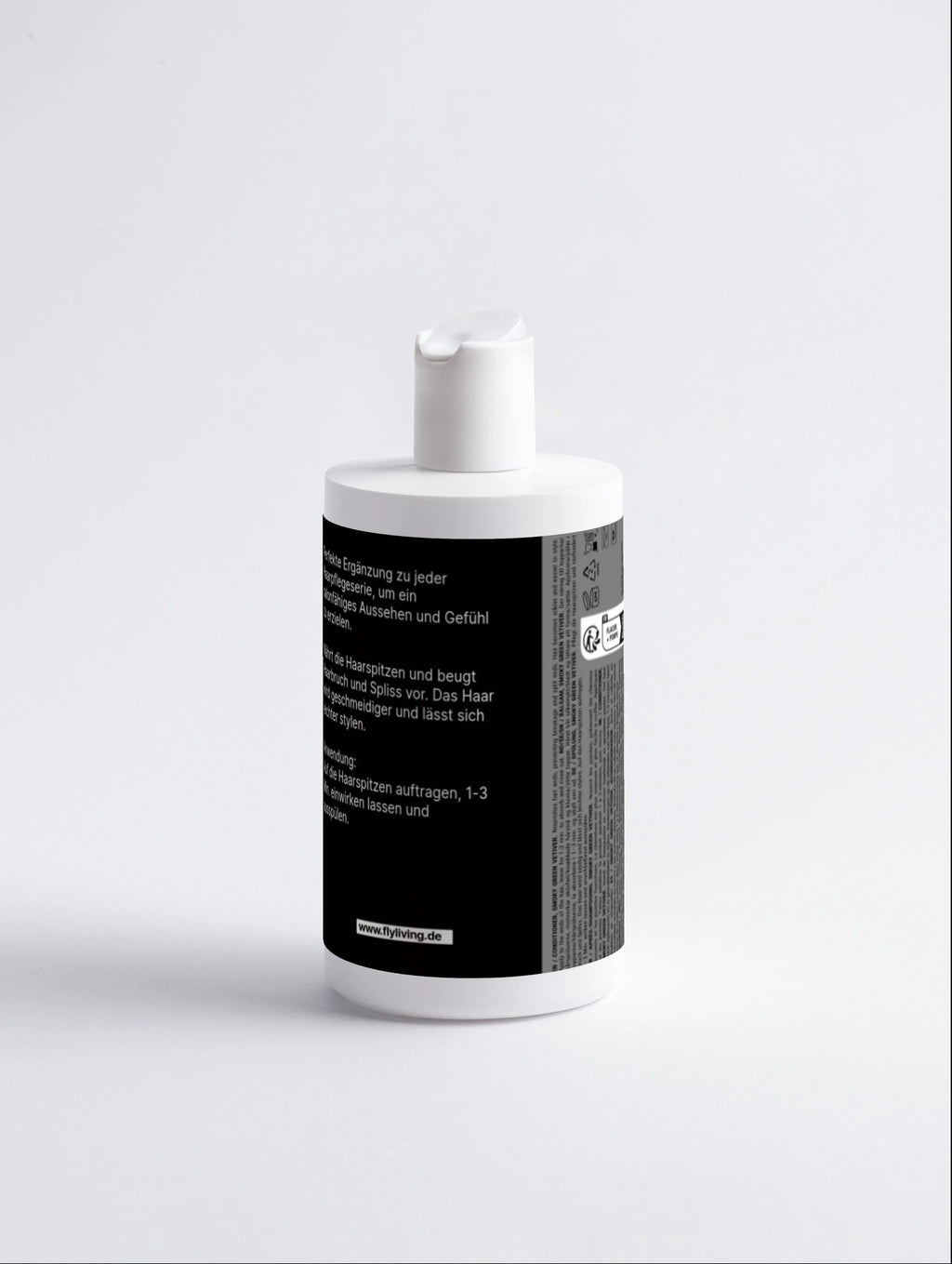 Spülung Smoky Green Vetiver von flyliving, weiße Flasche mit schwarzer Beschriftung vor hellem Hintergrund.