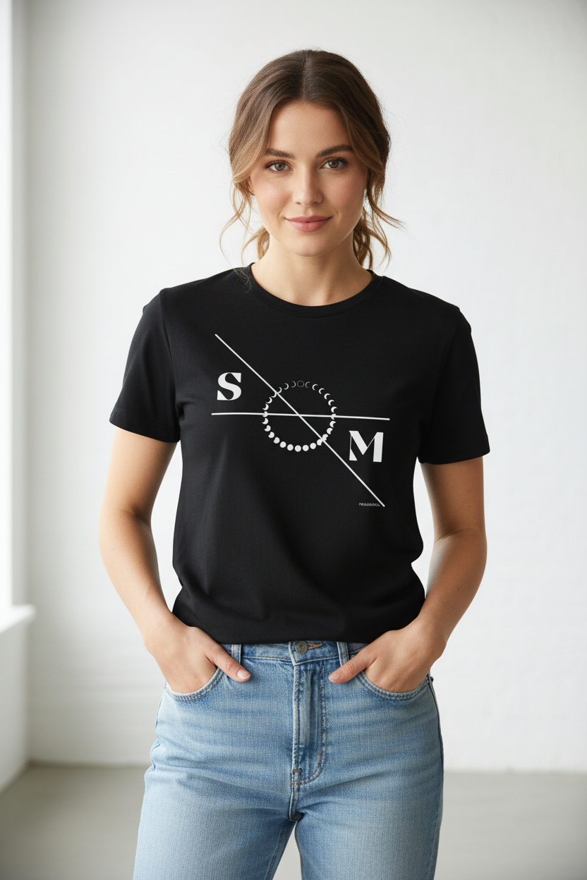 Black T-shirt by flyliving with a white graphic depicting "S" and "M" separated by lines and moon phases in a circle, worn by a woman.