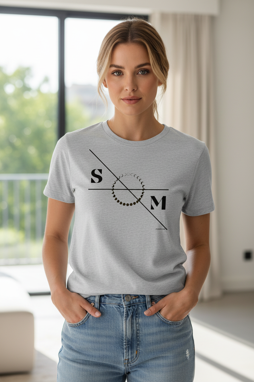 Light grey unisex T-shirt by flyliving, displaying a black moon phases graphic with S and M letters and crossing lines, worn by a woman in blue jeans.