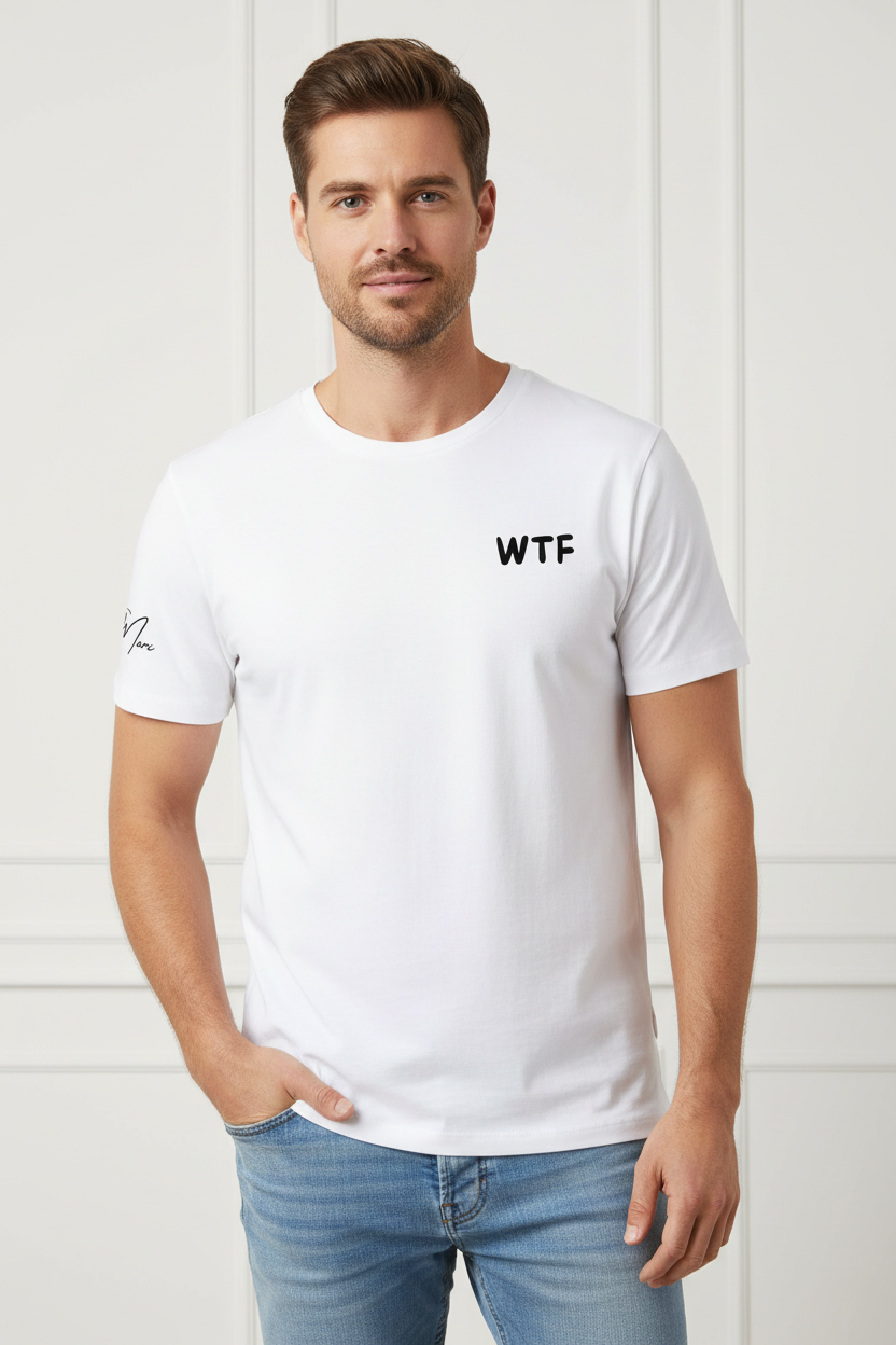 White cotton Unisex T-Shirt by flyliving with 'WTF' graphic on chest and small script on left sleeve, worn by a man in jeans.