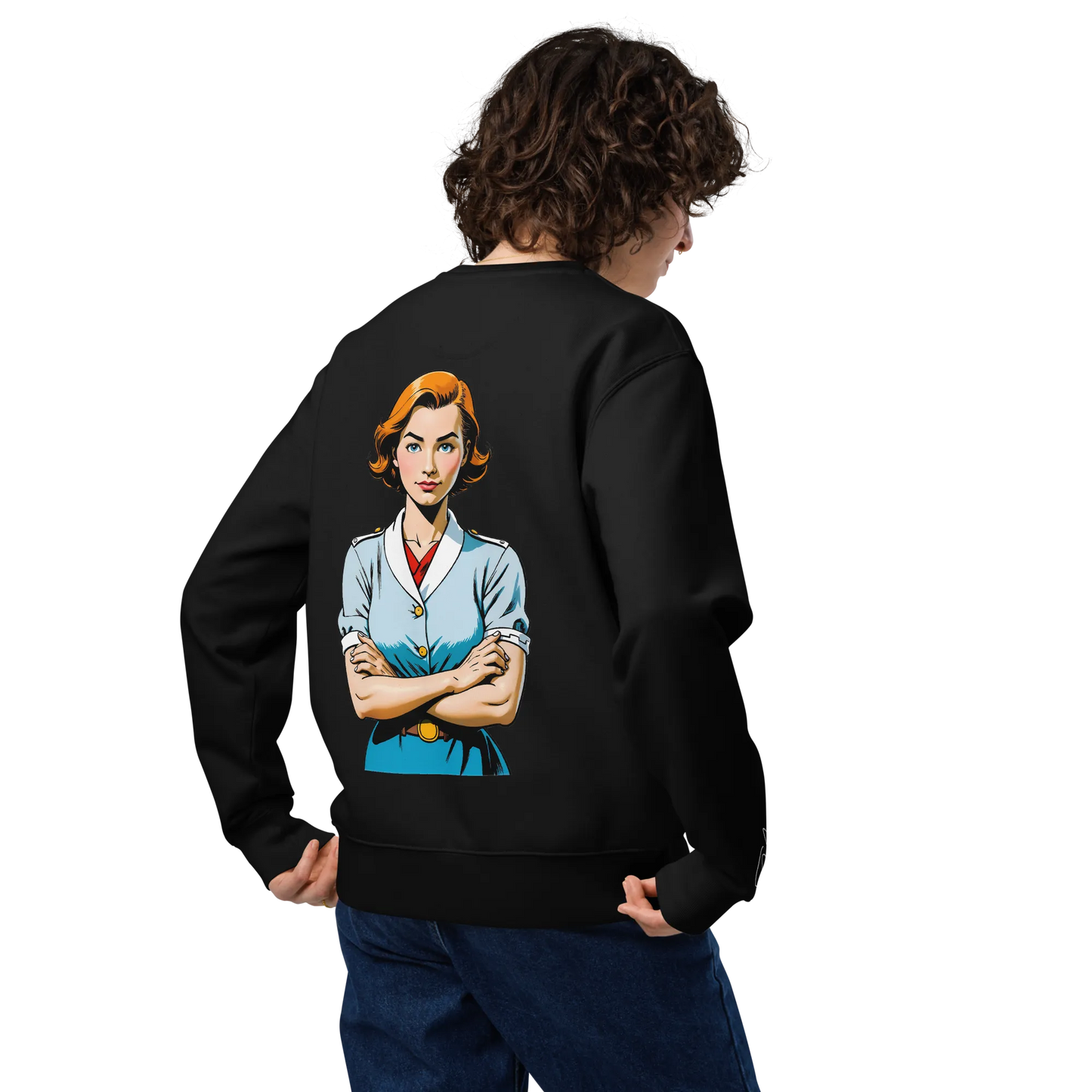 Eine Person mit lockigem Haar, von hinten gesehen, trägt den flyliving Pullover "Oh, really?" - einen schwarzen Pullover mit einer bunten Illustration einer selbstbewussten kurzhaarigen Frau mit verschränkten Armen auf dem Rücken.