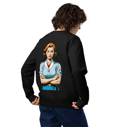 Eine Person mit lockigem Haar, von hinten gesehen, trägt den flyliving Pullover "Oh, really?" - einen schwarzen Pullover mit einer bunten Illustration einer selbstbewussten kurzhaarigen Frau mit verschränkten Armen auf dem Rücken.