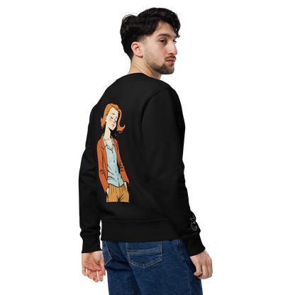 Ein Mann in Jeans und dem flyliving Pullover "chill", mit einer lebendigen Grafik einer Frau in einer orangen Jacke auf dem Rücken, steht vor einem schwarzen Hintergrund - ideal für einen entspannten Lifestyle.